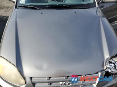 Zdjęcie 11 z 12 samochodu: 2004 HYUNDAI ACCENT GL VIN:KMHCG45C14U513691 - miniatura