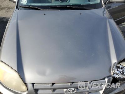 Zdjęcie 11 z 12 samochodu: 2004 HYUNDAI ACCENT GL VIN:KMHCG45C14U513691 - miniatura