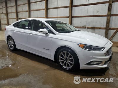 Czwarte zdjęcie samochodu z boku: 2017 FORD FUSION SE HYBRID VIN:3FA6P0LU1HR359637 - miniatura