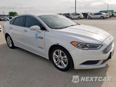 Czwarte zdjęcie samochodu z boku: 2018 FORD FUSION SE HYBRID VIN:3FA6P0LU6JR171668 - miniatura