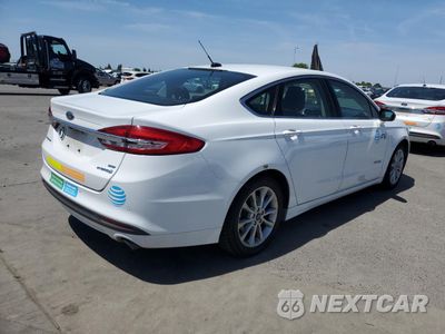 Trzecie zdjęcie samochodu z tyłu: 2017 FORD FUSION SE HYBRID VIN:3FA6P0LU5HR409360 - miniatura