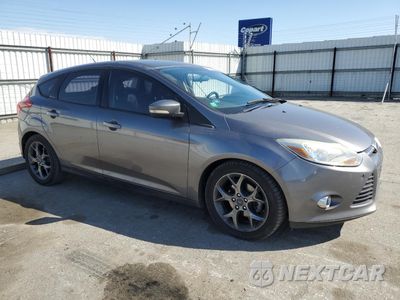 Czwarte zdjęcie samochodu z boku: 2014 FORD FOCUS SE VIN:1FADP3K21EL294565 - miniatura