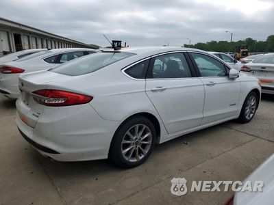 Trzecie zdjęcie samochodu z tyłu: 2017 FORD FUSION SE HYBRID VIN:3FA6P0LU1HR409663 - miniatura