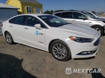Czwarte zdjęcie samochodu z boku: 2017 FORD FUSION SE HYBRID VIN:3FA6P0LU6HR408928 - miniatura