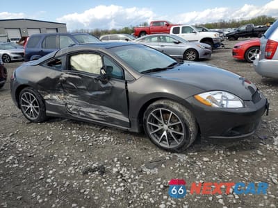 Czwarte zdjęcie samochodu z boku: 2011 MITSUBISHI ECLIPSE GS SPORT VIN:4A31K5DF8BE001636 - miniatura