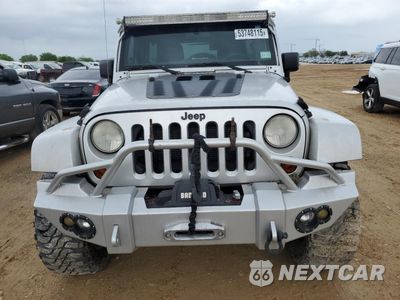 Piąte zdjęcie samochodu w środku: 2012 JEEP WRANGLER UNLIMITED SAHARA VIN:1C4HJWEG1CL254926 - miniatura