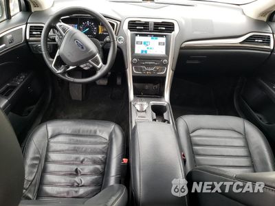 Zdjęcie 8 z 12 samochodu: 2017 FORD FUSION SE HYBRID VIN:3FA6P0LU0HR409489 - miniatura