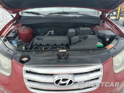 Zdjęcie 12 z 15 samochodu: 2012 HYUNDAI SANTA FE LIMITED VIN:5XYZK3AB6CG143066 - miniatura