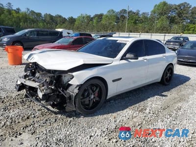 2014 BMW 740 I WBAYA6C58ED144242 - główne zdjęcie licytacji z USA - miniatura