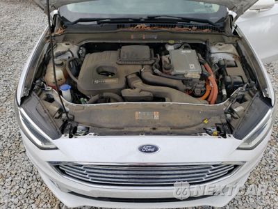 Zdjęcie 11 z 12 samochodu: 2018 FORD FUSION SE HYBRID VIN:3FA6P0LU9JR171759 - miniatura