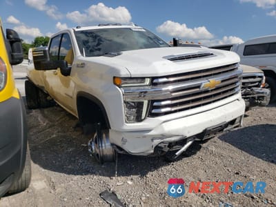 Czwarte zdjęcie samochodu z boku: 2021 CHEVROLET SILVERADO K3500 HIGH COUNTRY VIN:1GC4YVEY2MF214299 - miniatura
