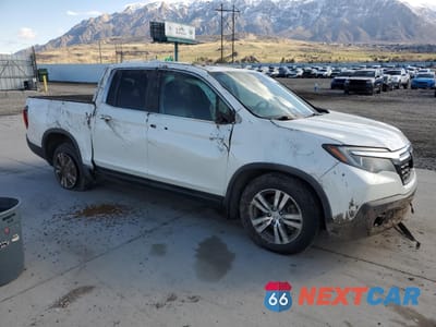 Czwarte zdjęcie samochodu z boku: 2017 HONDA RIDGELINE RTL VIN:5FPYK3F50HB506269 - miniatura