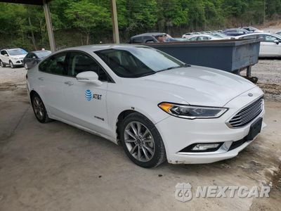 Czwarte zdjęcie samochodu z boku: 2017 FORD FUSION SE HYBRID VIN:3FA6P0LU8HR409482 - miniatura