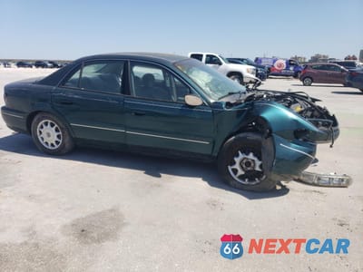 Czwarte zdjęcie samochodu z boku: 2001 BUICK CENTURY CUSTOM VIN:2G4WS52JX11101829 - miniatura