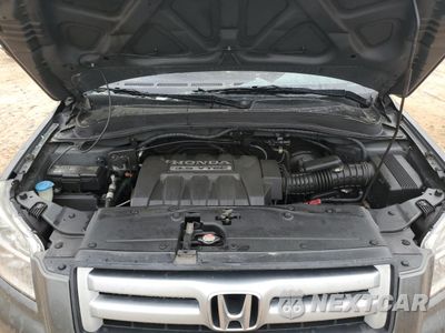 Zdjęcie 13 z 14 samochodu: 2007 HONDA PILOT EX VIN:2HKYF18407H521778 - miniatura