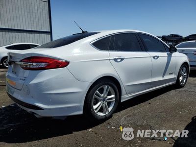 Trzecie zdjęcie samochodu z tyłu: 2018 FORD FUSION SE HYBRID VIN:3FA6P0LU8JR171591 - miniatura