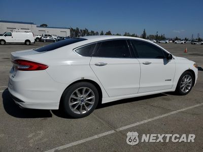 Trzecie zdjęcie samochodu z tyłu: 2017 FORD FUSION SE HYBRID VIN:3FA6P0LU8HR408896 - miniatura