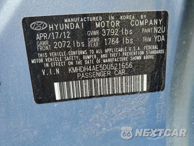 Zdjęcie 14 z 14 samochodu: 2013 HYUNDAI ELANTRA GLS VIN:KMHDH4AE5DU521656 - miniatura