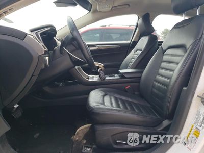 Zdjęcie 7 z 12 samochodu: 2017 FORD FUSION SE HYBRID VIN:3FA6P0LUXHR359569 - miniatura