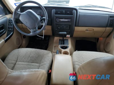 Zdjęcie 8 z 13 samochodu: 2000 JEEP CHEROKEE SPORT VIN:1J4FT48SXYL134212 - miniatura