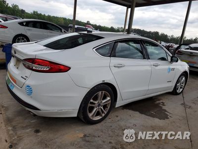 Trzecie zdjęcie samochodu z tyłu: 2018 FORD FUSION SE HYBRID VIN:3FA6P0LU2JR163535 - miniatura