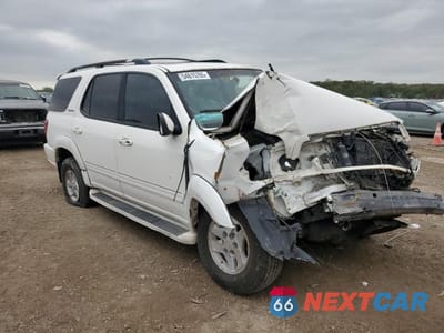 Czwarte zdjęcie samochodu z boku: 2002 TOYOTA SEQUOIA LIMITED VIN:5TDBT48A32S064411 - miniatura