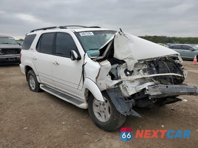 Czwarte zdjęcie samochodu z boku: 2002 TOYOTA SEQUOIA LIMITED VIN:5TDBT48A32S064411 - miniatura