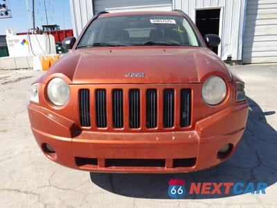 Piąte zdjęcie samochodu w środku: 2009 JEEP COMPASS SPORT VIN:1J4FF47B49D135411 - miniatura