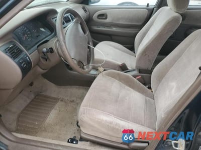 Zdjęcie 7 z 12 samochodu: 1997 TOYOTA COROLLA DX VIN:1NXBB02E8VZ519692 - miniatura