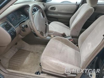Zdjęcie 7 z 12 samochodu: 1997 TOYOTA COROLLA DX VIN:1NXBB02E8VZ519692 - miniatura