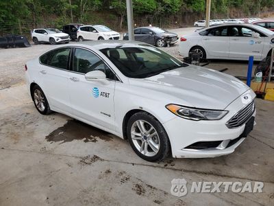 Czwarte zdjęcie samochodu z boku: 2018 FORD FUSION SE HYBRID VIN:3FA6P0LU2JR163535 - miniatura