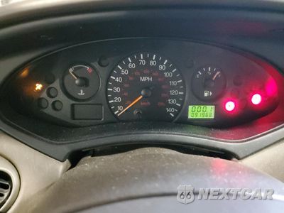 Zdjęcie 9 z 15 samochodu: 2000 FORD FOCUS SE VIN:1FAHP36P7YW219878 - miniatura