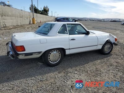 Trzecie zdjęcie samochodu z tyłu: 1989 MERCEDES-BENZ 560 SL VIN:WDBBA48D9KA103806 - miniatura