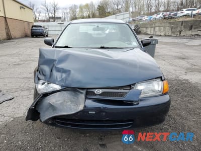 Piąte zdjęcie samochodu w środku: 1998 MAZDA PROTEGE DX VIN:JM1BC1411W0238344 - miniatura
