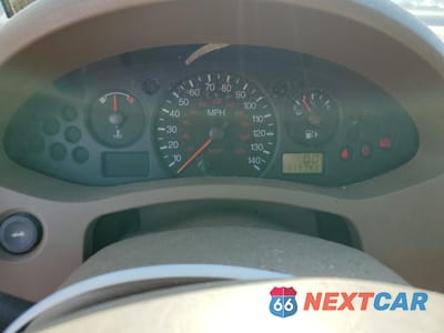 Zdjęcie 9 z 12 samochodu: 2004 FORD FOCUS ZX4 VIN:1FAHP34N06W142317 - miniatura