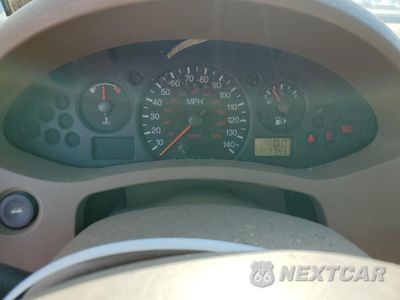 Zdjęcie 9 z 12 samochodu: 2004 FORD FOCUS ZX4 VIN:1FAHP34N06W142317 - miniatura