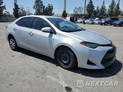 Czwarte zdjęcie samochodu z boku: 2017 TOYOTA COROLLA L VIN:5YFBURHE0HP584080 - miniatura