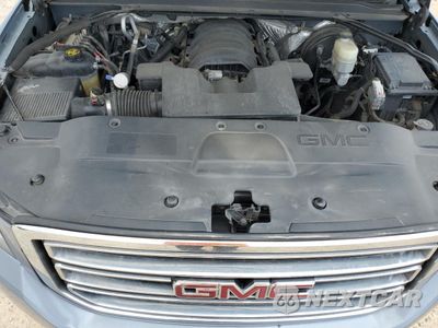 Zdjęcie 12 z 13 samochodu: 2015 GMC YUKON SLE VIN:1GKS1AKCXFR672157 - miniatura