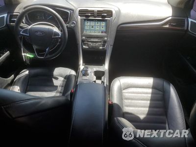 Zdjęcie 8 z 13 samochodu: 2018 FORD FUSION SE HYBRID VIN:3FA6P0LU1JR278627 - miniatura