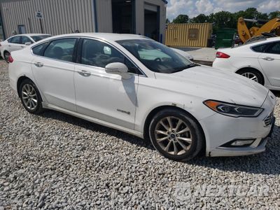 Czwarte zdjęcie samochodu z boku: 2017 FORD FUSION SE HYBRID VIN:3FA6P0LU7HR359691 - miniatura