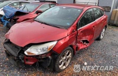 Drugie zdjęcie samochodu z przodu: 2012 FORD FOCUS TITANIUM VIN:1FAHP3N29CL445355 - miniatura