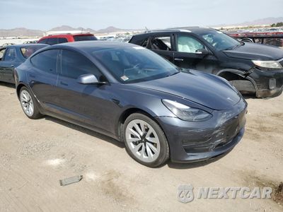 Czwarte zdjęcie samochodu z boku: 2022 TESLA MODEL 3 VIN:5YJ3E1EB4NF279749 - miniatura