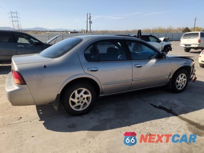 Trzecie zdjęcie samochodu z tyłu: 1999 NISSAN MAXIMA GLE VIN:JN1CA21A9XT707073 - miniatura