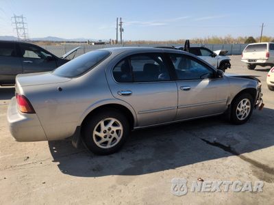 Trzecie zdjęcie samochodu z tyłu: 1999 NISSAN MAXIMA GLE VIN:JN1CA21A9XT707073 - miniatura