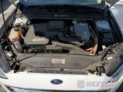 Zdjęcie 11 z 14 samochodu: 2017 FORD FUSION SE HYBRID VIN:3FA6P0LU6HR409285 - miniatura