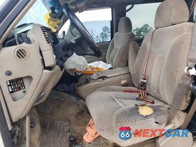 Zdjęcie 7 z 13 samochodu: 1999 CHEVROLET TAHOE K1500 VIN:1GNEK13R8XJ398392 - miniatura