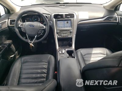 Zdjęcie 8 z 12 samochodu: 2017 FORD FUSION SE HYBRID VIN:3FA6P0LUXHR359569 - miniatura