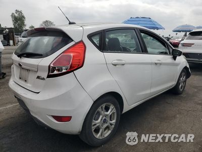 Trzecie zdjęcie samochodu z tyłu: 2016 FORD FIESTA SE VIN:3FADP4EJ3GM112455 - miniatura