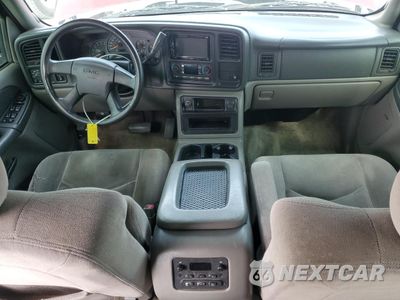 Zdjęcie 8 z 15 samochodu: 2003 GMC YUKON VIN:1GKEC13V73R208570 - miniatura
