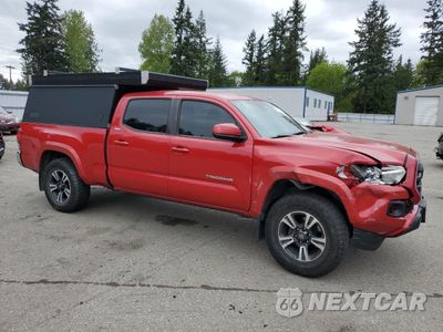 Czwarte zdjęcie samochodu z boku: 2019 TOYOTA TACOMA DOUBLE CAB VIN:3TMDZ5BN7KM061228 - miniatura
